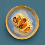 Tagilatelle com mexilhao e beurre blanc