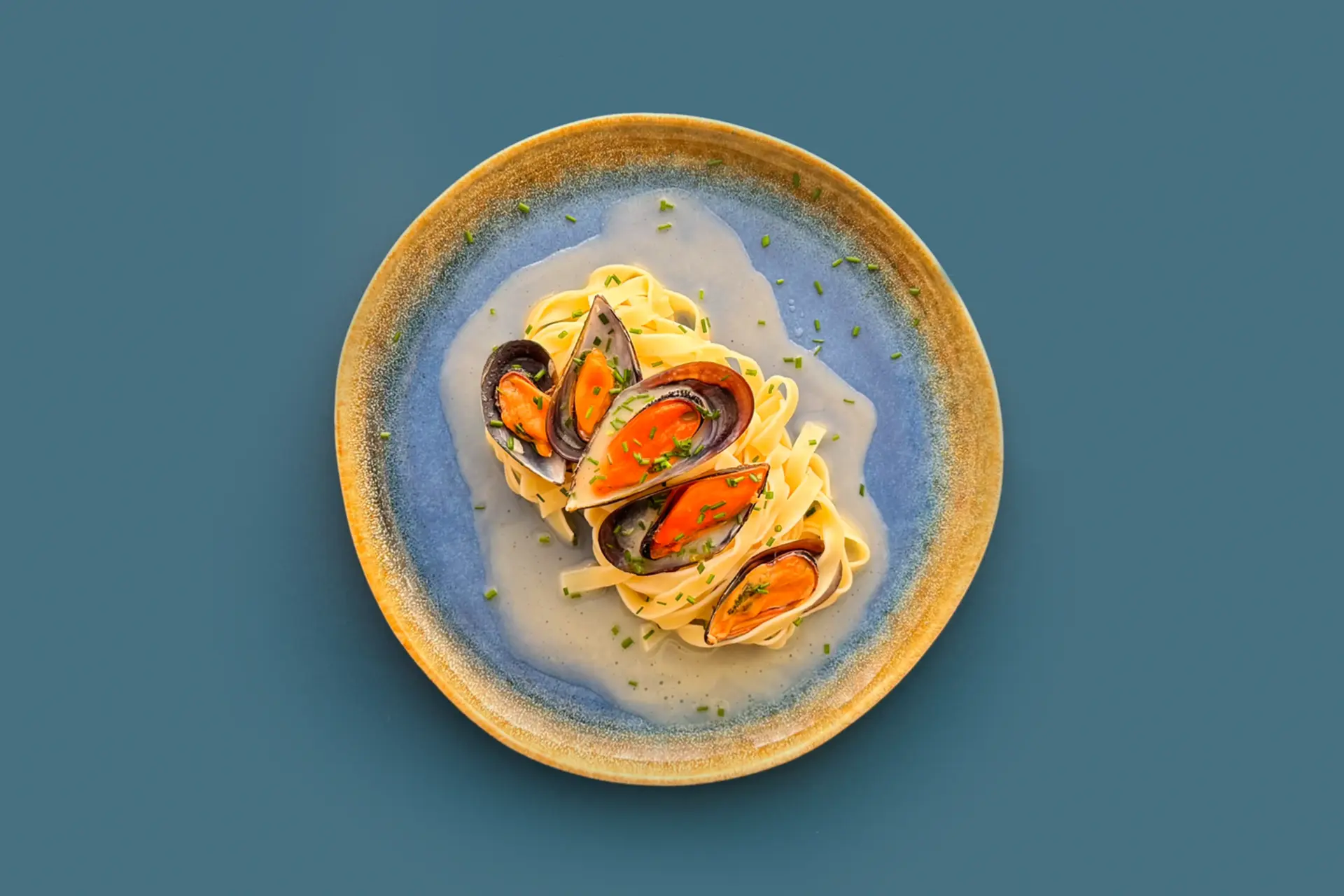 Tagilatelle com mexilhao e beurre blanc